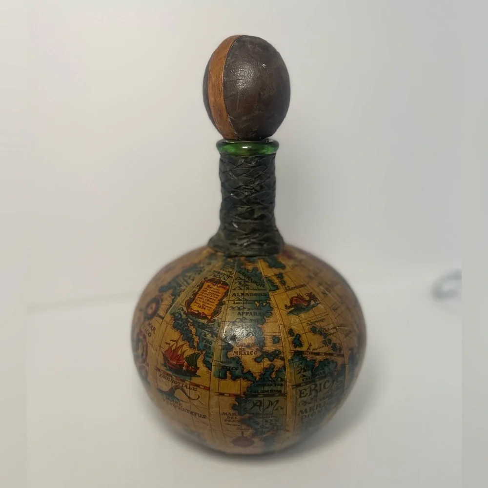 Vintage leather covered globe decanter. Made in Italy.